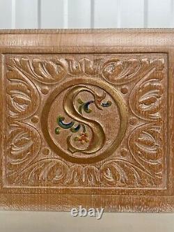 A Stunning Carved Panel in oak with the letter S