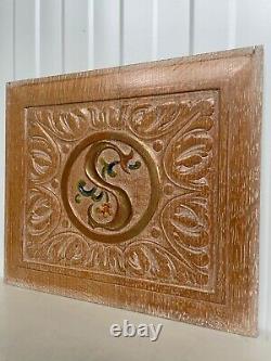 A Stunning Carved Panel in oak with the letter S