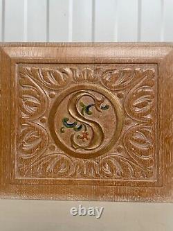 A Stunning Carved Panel in oak with the letter S