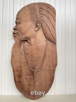 A Stunning Large Carved panel in wood 34.17 inch high