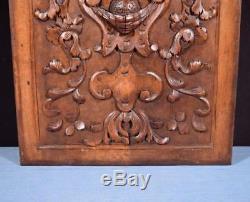 Antique French Panel in Solid Walnut Wood with Face Highly Carved