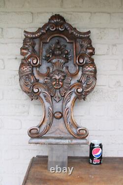 Antique black forest wood carved panel caryatid angel backrest chair