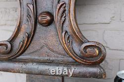 Antique black forest wood carved panel caryatid angel backrest chair
