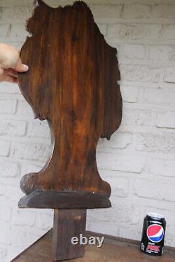 Antique black forest wood carved panel caryatid angel backrest chair