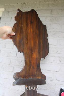 Antique black forest wood carved panel caryatid angel backrest chair