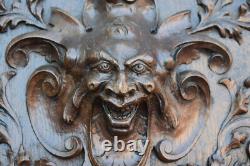Antique oak wood carved devil satyr head dragon mythological door panel plaque