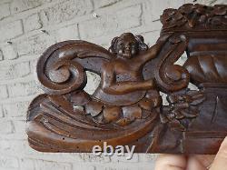 Antique wood carved putti cherub figural wall plaque panel