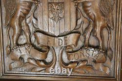 Antique wood carved wall panel coat of arms knight mythological dragons rare