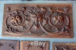 Five pieces of antique Italian carved wood paneling
