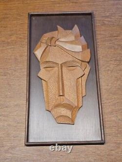 Mid-Century Carved Wood Relief Mask Wall Sculpture Panel, a pair, circa 1960