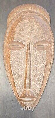 Mid-Century Carved Wood Relief Mask Wall Sculpture Panel, a pair, circa 1960