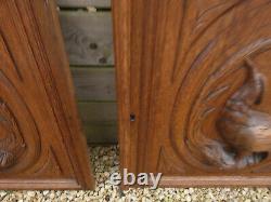 Pair antique wood carved hunting cabinet panels birds