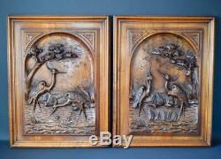 Pair of French Black Forest Hand Carved Walnut Wood Panels of Birds Crane