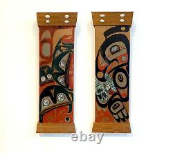 Pair of Northwest Coast Native Carved and Painted Cedar Panels
