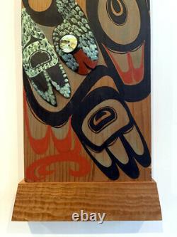 Pair of Northwest Coast Native Carved and Painted Cedar Panels