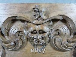 Renaissance-style carved oak bas-relief with Devil's head, grotesque and foliage